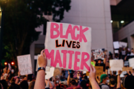 Students holding black lives matter sign